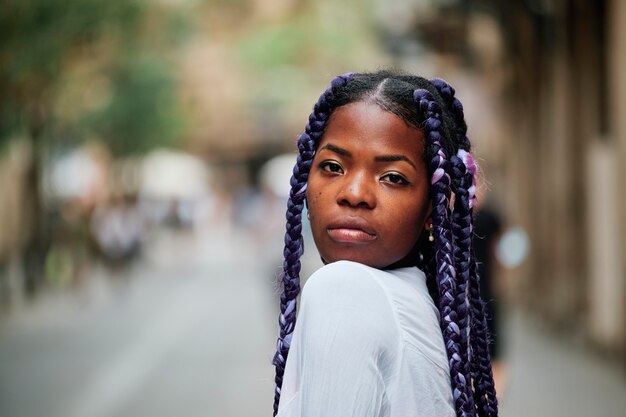 Portrait of a black girl walking in the city