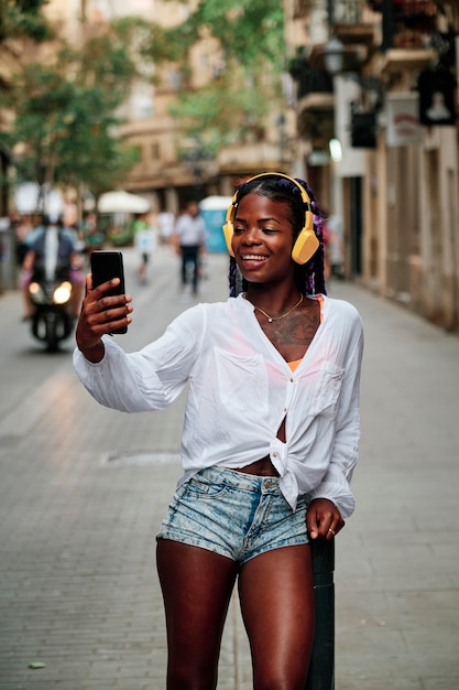 Portrait of a black girl walking in the city