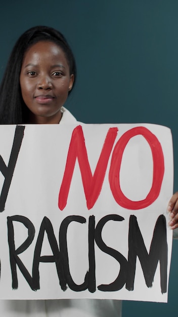 Portrait of black woman with banner