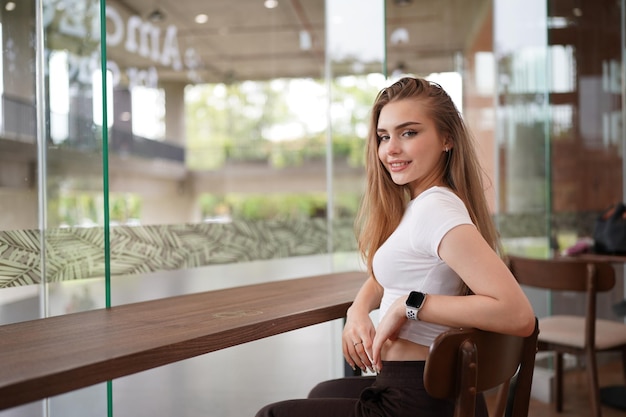 Portrait of blonde girl with fluttering hair