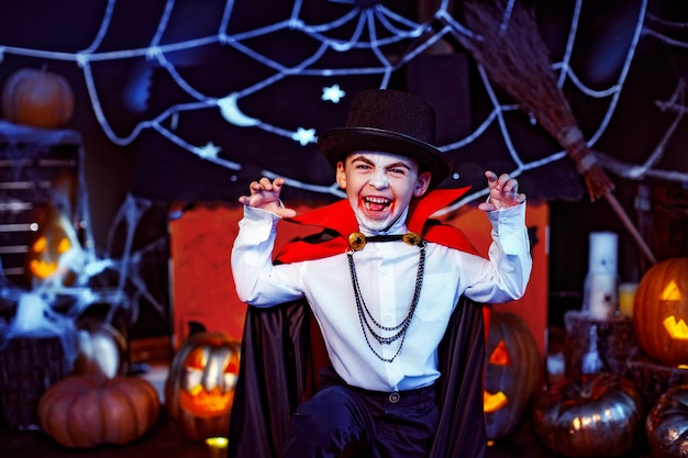 Portrait of a boy dressed in a costume of a vampire