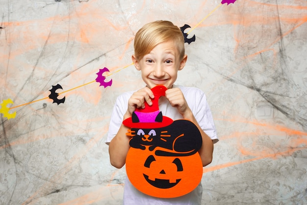 portrait boy showing funny faces for camera