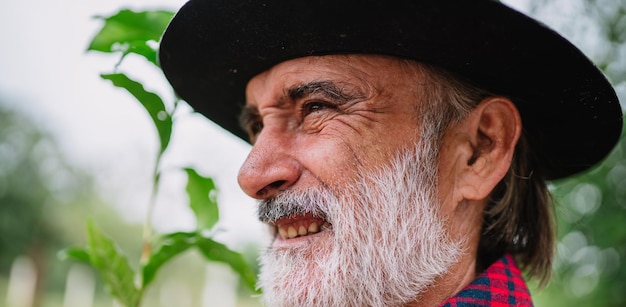 Portrait of Brazilian farmer man in the casual shirt in the farm