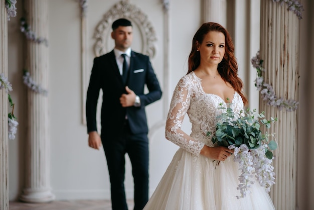 portrait of the bride and groom in the background