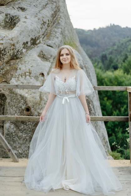 Portrait of a bride in the mountains.