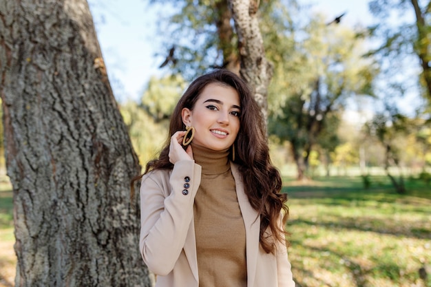 Portrait of a brunette girl in the park