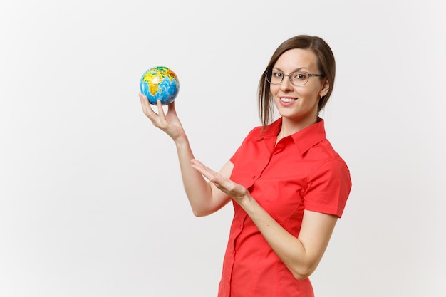 Portrait of business or teacher woman in red shirt holding in palms Earth globe isolated on white background. Problem of environmental pollution. Stop nature garbage, environment protection concept.