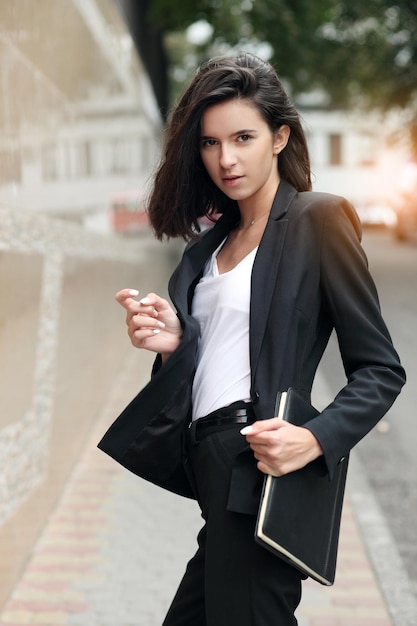 Portrait of business woman smiling outdoor