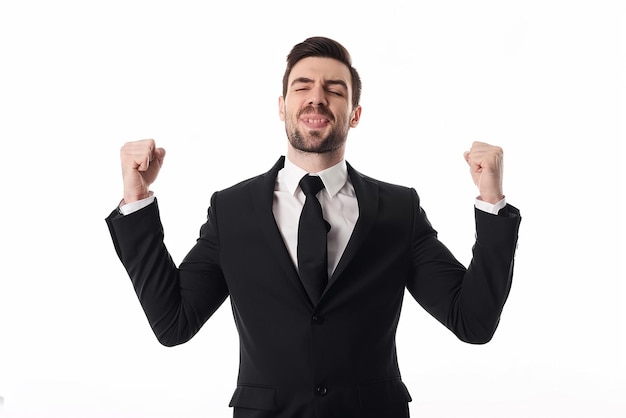 portrait of businessman excited on white isolated background