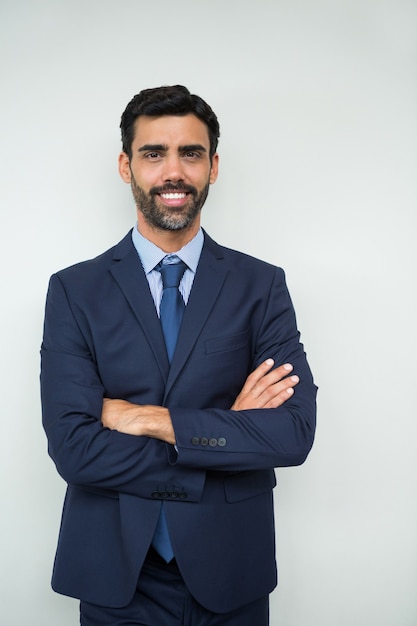 Portrait of businessman smiling at conference centre