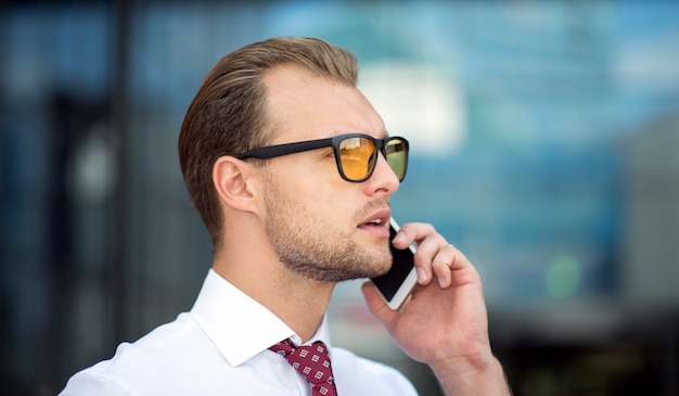 Portrait of a businessman talking on the phone