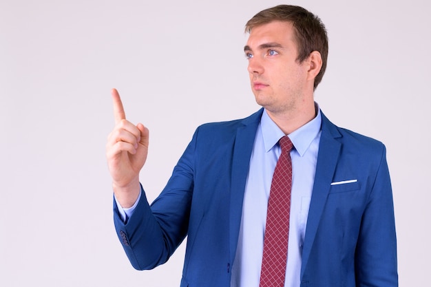 portrait of businessman wearing suit on white