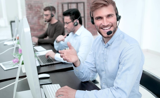 Portrait of the call center operator in the workplace