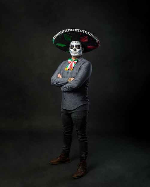 Portrait of a catrin wearing a charro hat Typical Mexican character Day of the dead make up