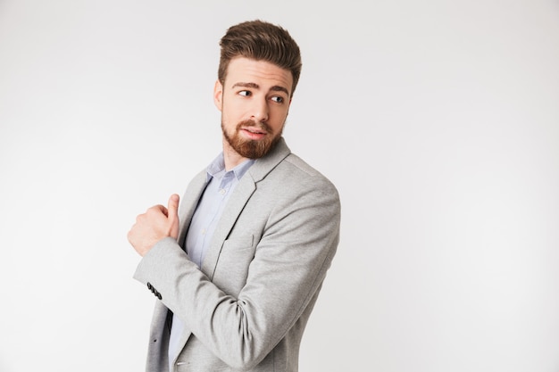 Portrait of a charming young man dressed in shirt