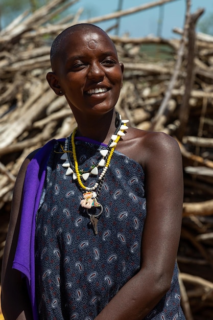 Portrait of a cheerful African woman in traditional dress from the Maasai tribe Kenya