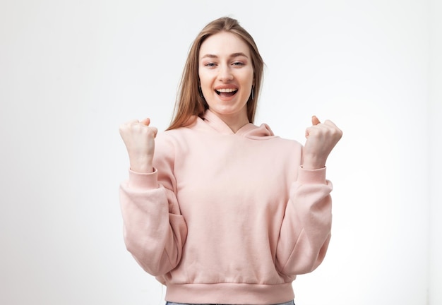 Portrait of cheerful emotional Caucasian woman isolated on white background