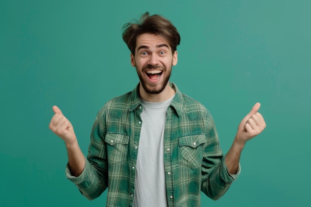 Photo portrait of a cheerful hipster guy smiles happily with excited expression dressed casually