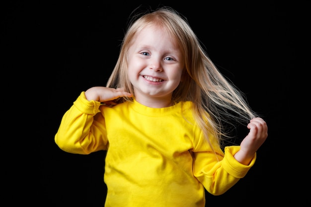 Portrait of a cheerful little girl