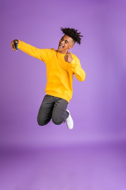 Portrait of a cheerful young afro american man