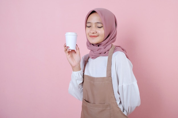 Portrait cheerful young asian woman with white cup or glass