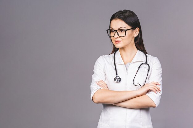 Portrait of cheerful young female doctor with stethoscope over neck 