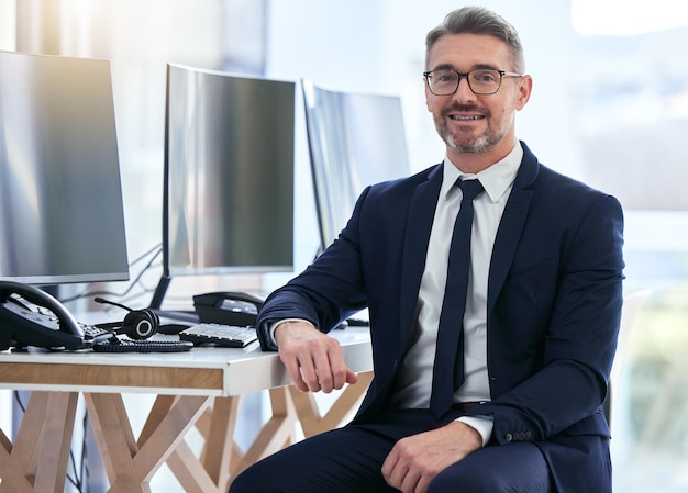 Portrait of computer information technology manager software programmer or business man engineer Trust leadership and vision of an IT man in company cybersecurity management with smile for success