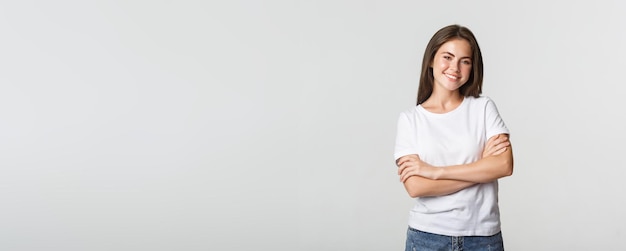 Portrait of confident attractive woman cross arms chest and smiling pleased