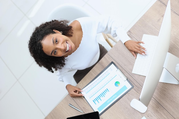 Portrait of confident businesswoman in modern office