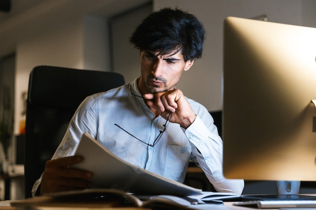 Portrait of a confident concentrated businessman working