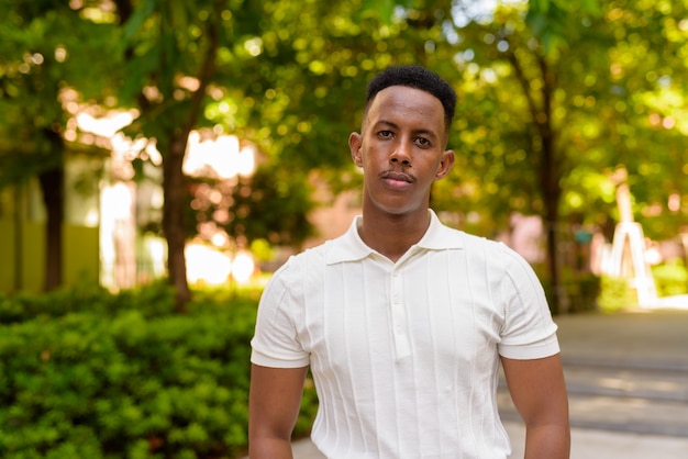 Portrait of confident young African businessman wearing casual clothes