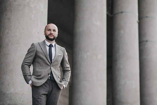 Portrait of a confident young business man in city . Portrait business concept.