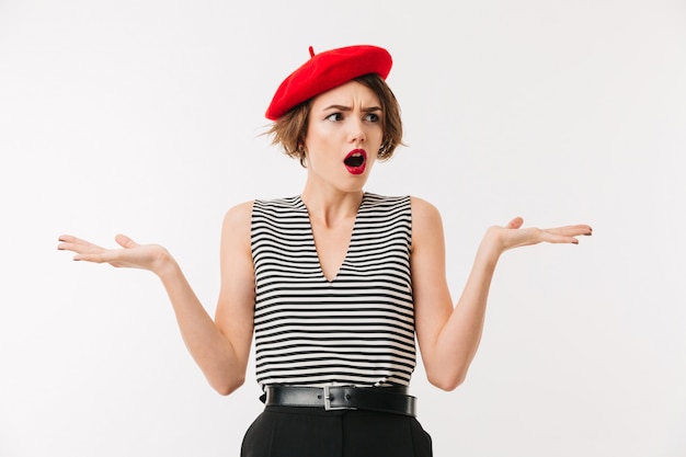 Portrait of a confused woman wearing red beret