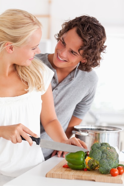 Photo portrait of a couple cooking