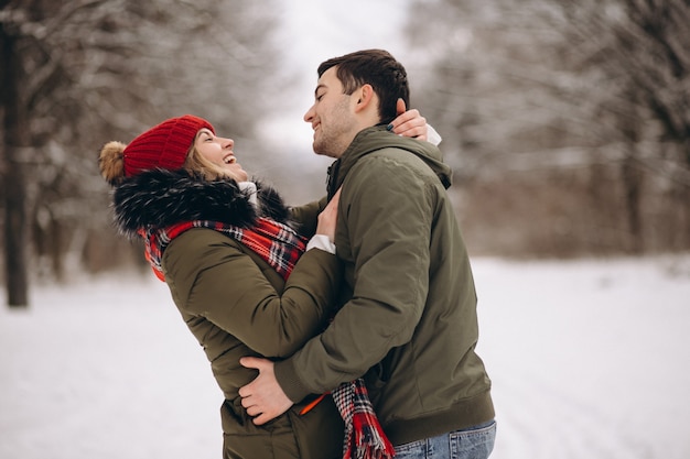 Portrait of a couple in a winter park