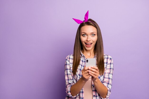 Portrait of crazy girl using smartphone