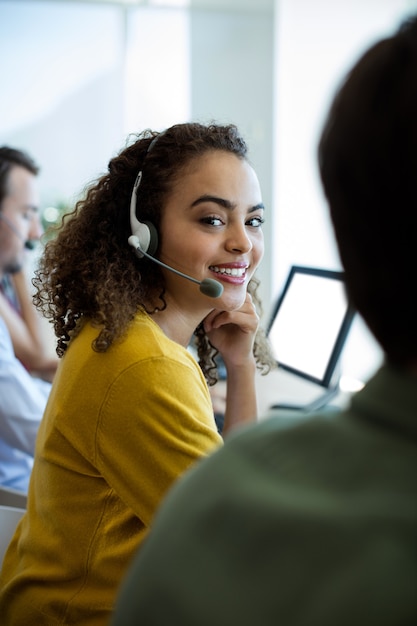 Portrait of customer service executive working at office