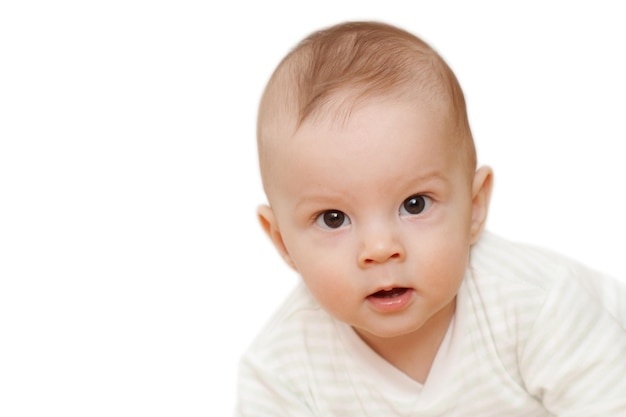 Portrait of cute baby boy against white background