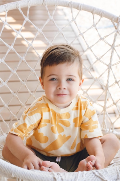 Portrait of cute baby boy looking away