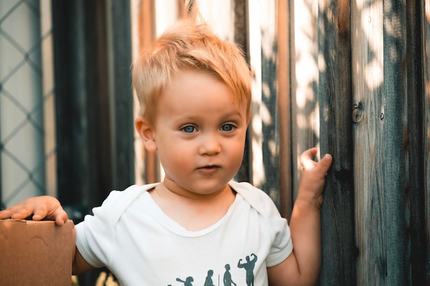 Portrait of cute boy outdoors