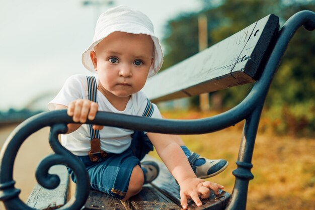 Portrait of a cute boy with summer hat