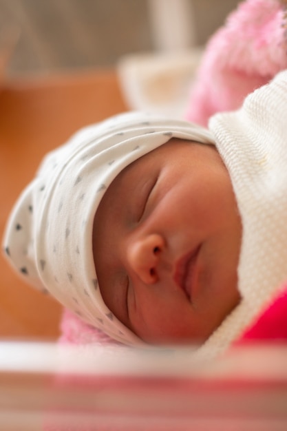 Portrait of a cute newborn baby girl