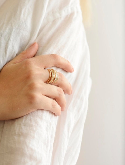 portrait of a cute woman with gold jewelry