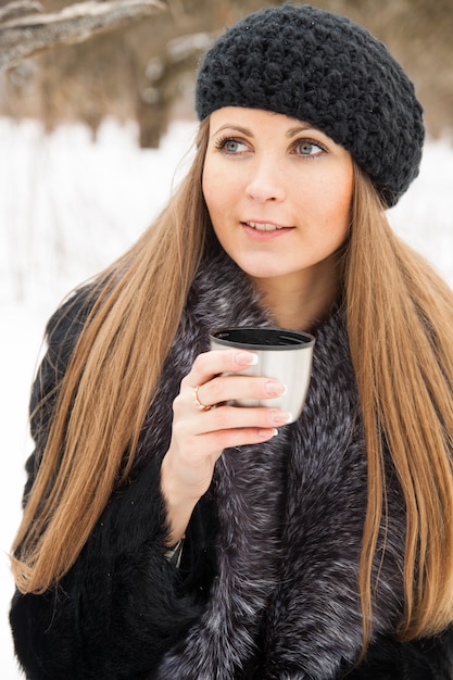 Portrait of dark blond young woman