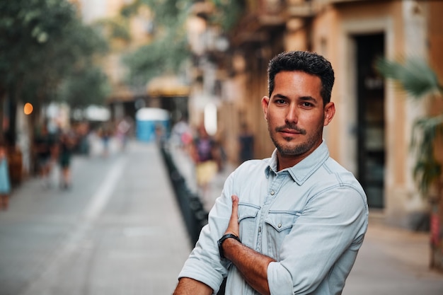 Portrait of a darkhaired Latin boy posing for a photo session