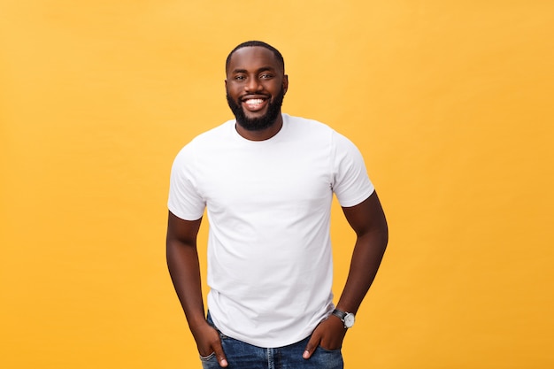 Portrait of delighted African American male with positive smile