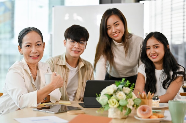 A portrait of a diverse business people group sitting together in the office