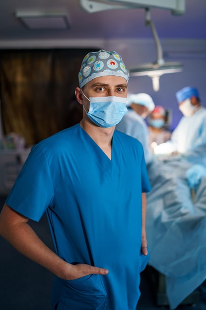 Portrait of a doctor Male medical specialist Surgeon or neurologist Medical room background