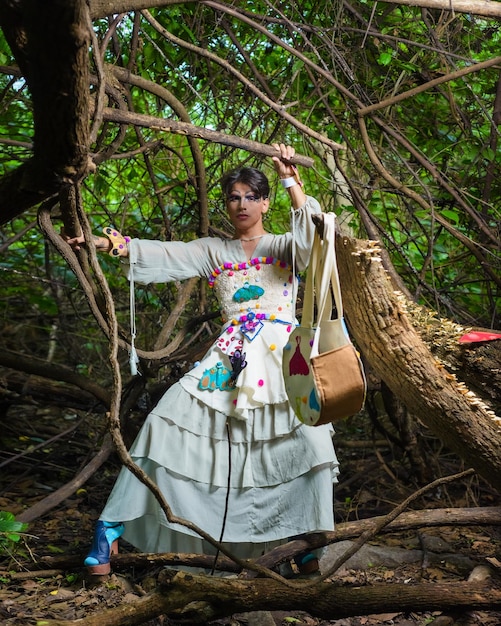 Portrait of a drag queen in a rural scenery Nonbinary gender person interacting with nature