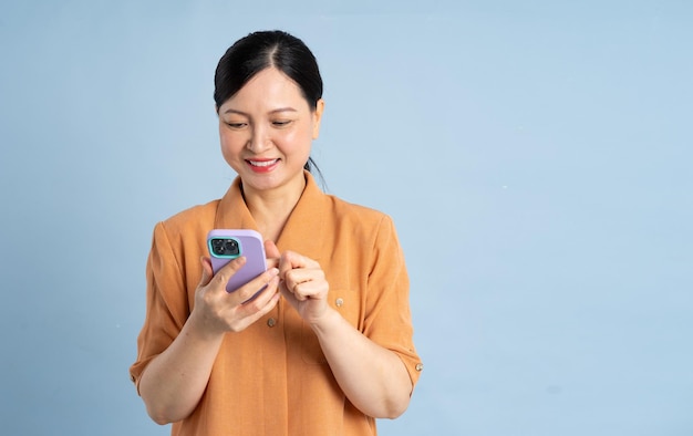 Portrait of an elderly woman using a smartphone